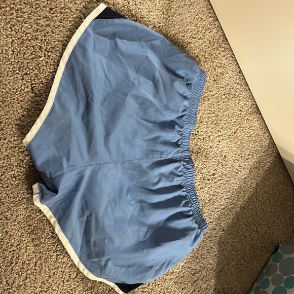 Nike Womens tempo running shorts in light and dark blue - Picture 2 of 3